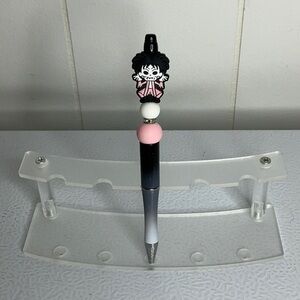 Black and Pink Character Pen